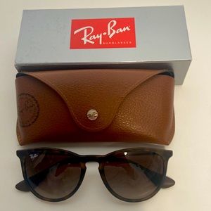 Brand new Ray-Ban glasses barely worn. Turquoise black and brown in color.